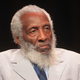 Comedian and social activist Dick Gregory onstage at the Independent Lens “Soul Food Junkies” panel during the PBS portion of the 2012 Summer TCA Tour at the Beverly Hilton Hotel in California on July 21, 2012. (Frederick M. Brown/Getty Images)